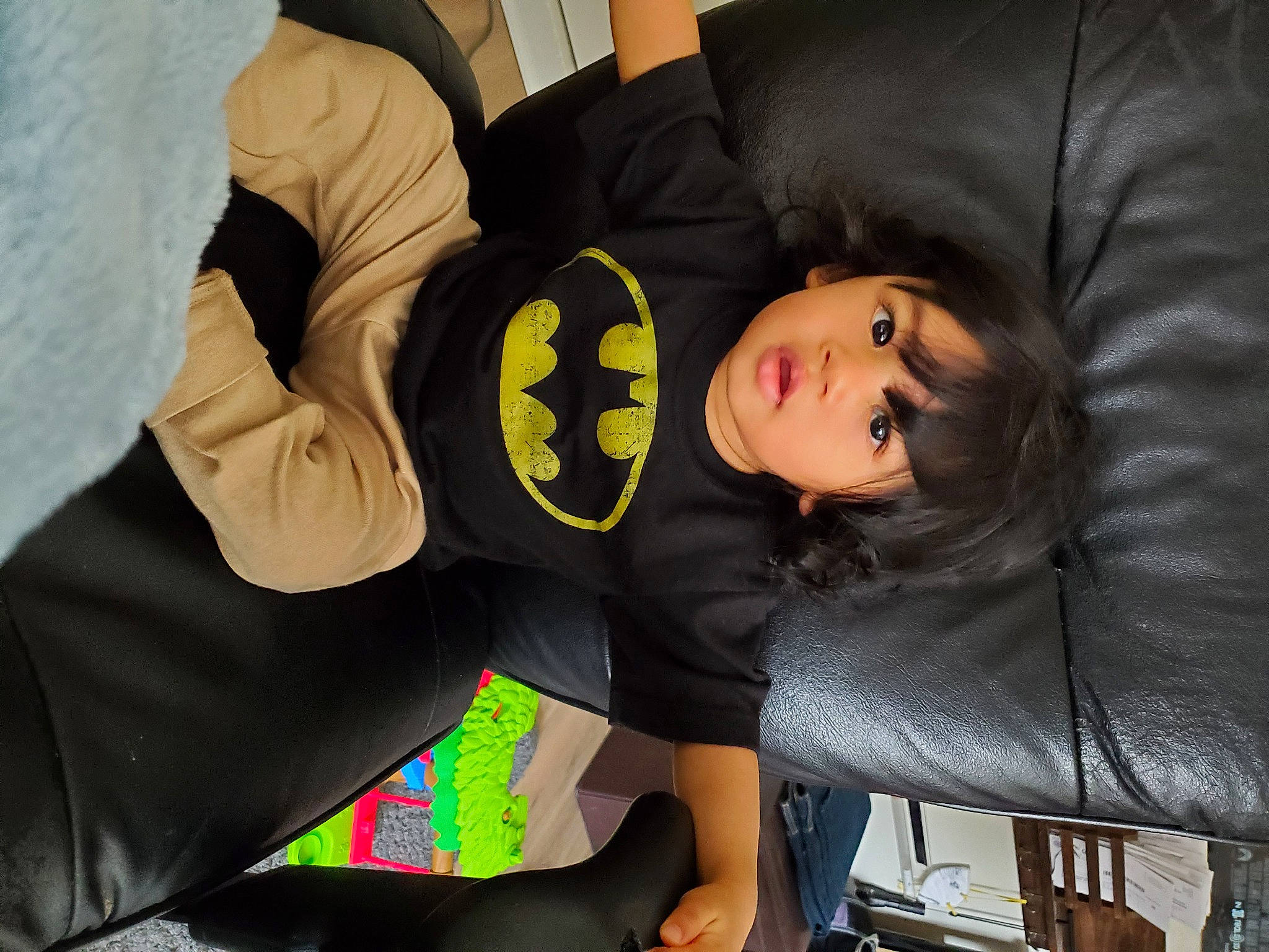 Xavier joined the competition — help win amazing prizes! black_hair, comfort, couch, fun, hairstyle, human_body, human_leg, joint, leg, linens, outerwear, people, person, sitting, sleeve, studio_couch, stuffed_toy, t_shirt, textile, thigh