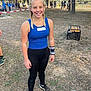 Chelsea participe au concours pour gagner de l'argent avec cette photo : child, girl, blonde_hair, braids, smiling, sporty, tank_top, leggings, sneakers, wristband, outdoor, grass, trees, people, event, daylight, happy, standing, nature, group