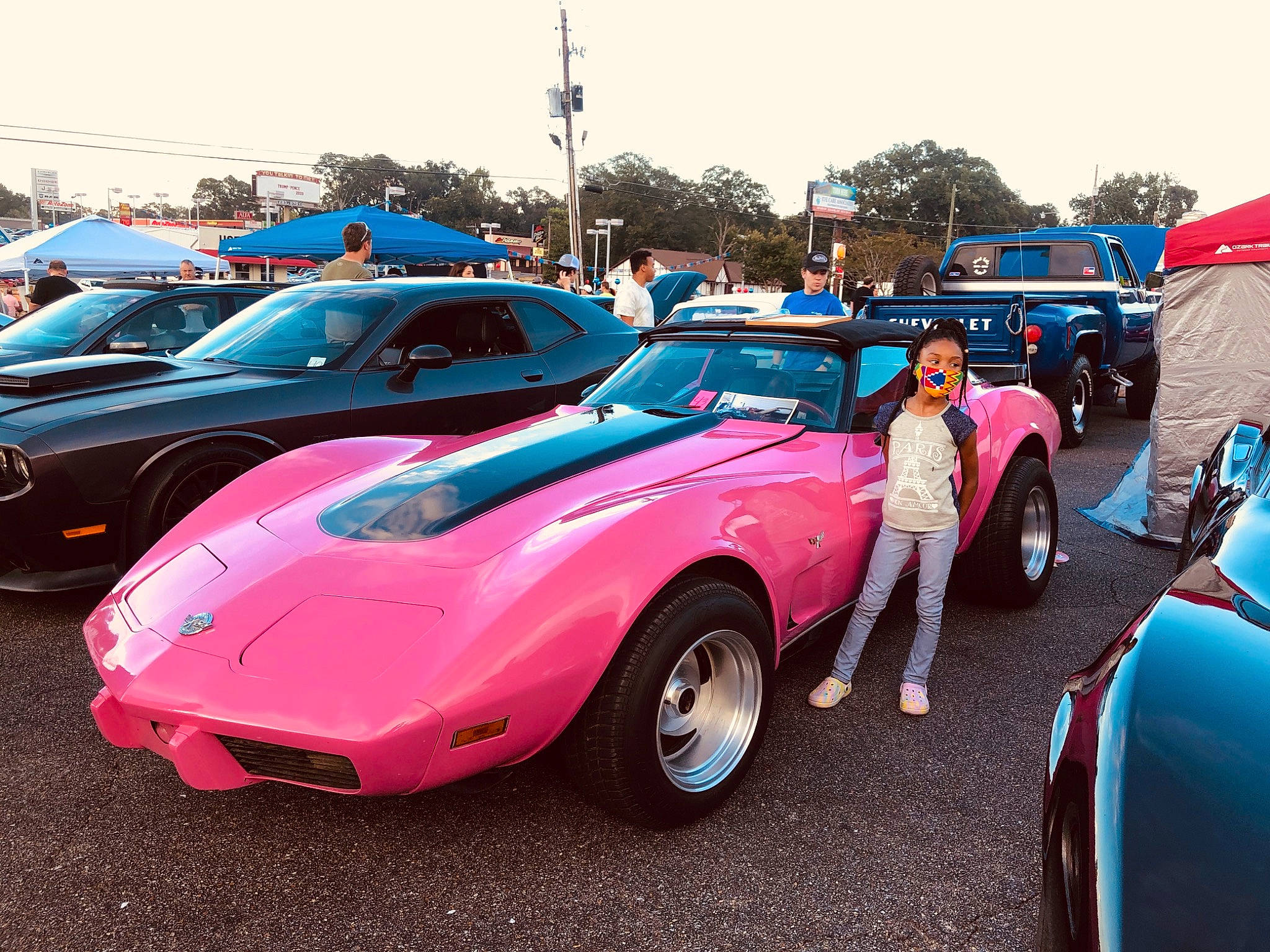 Alexus is registered to the contest to win money with this photo: antique_car, auto_show, automotive_design, car, classic, classic_car, coupe, custom_car, hardtop, hot_rod, land_vehicle, motor_vehicle, muscle_car, performance_car, person, pink, sedan, sports_car, vehicle, vintage_car