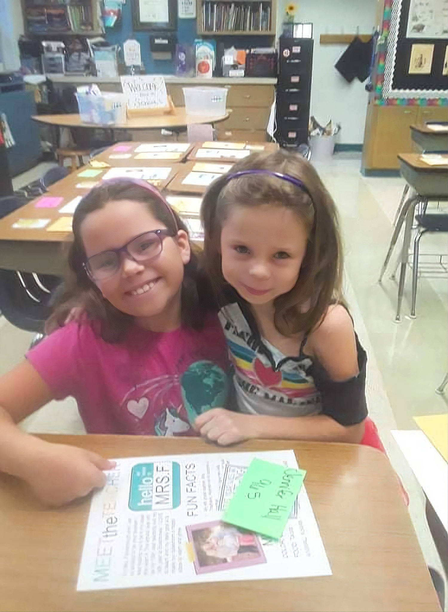 Frances is registered to the contest to win money with this photo: chair, child, class, desk, education, event, eyewear, fun, furniture, glasses, happy, joy, learning, leisure, people, person, picture_frame, shelf, smile, t_shirt