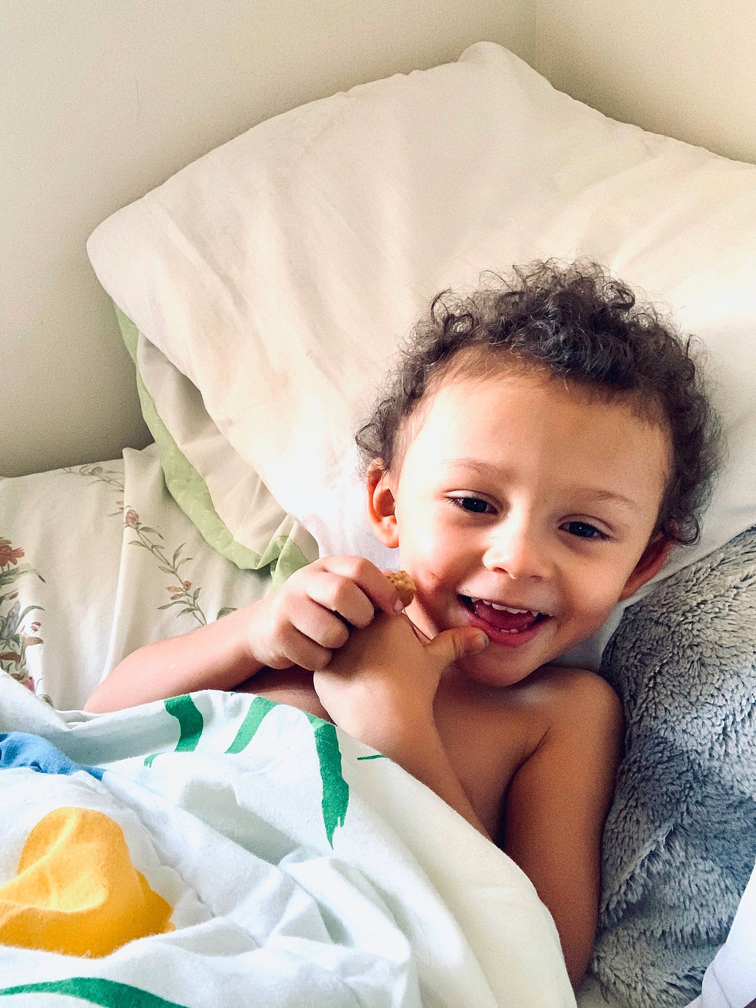 Grayson is registered to the contest to win money with this photo: baby, bed, bedding, bedtime, child, comfort, furniture, happy, joy, linens, nose, person, pillow, room, skin, sleep, smile, textile, toddler
