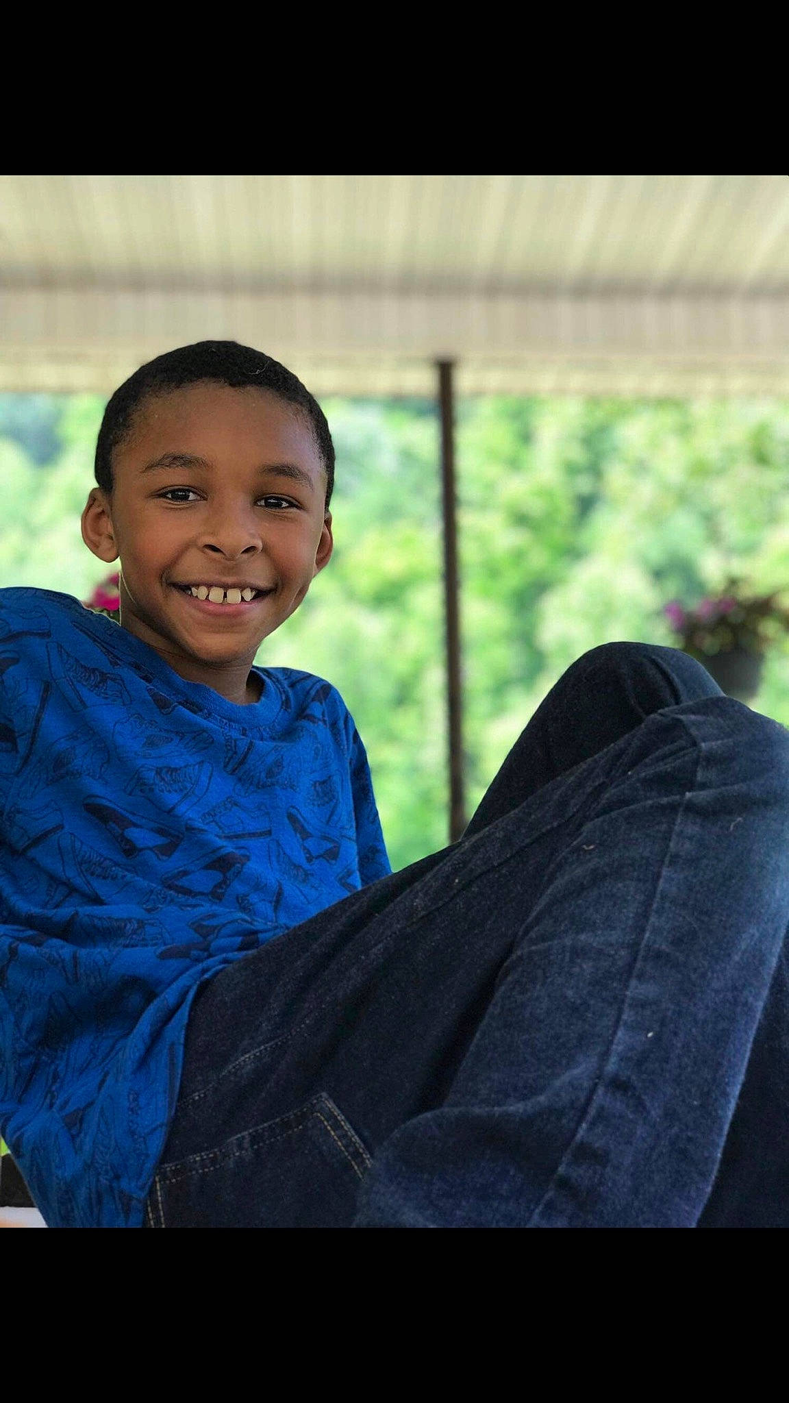 Deandre is registered to the contest to win money with this photo: adaptation, blue, cheek, child, eye, face, facial_expression, happy, head, human, joy, laugh, people, person, photography, portrait, portrait_photography, sitting, smile