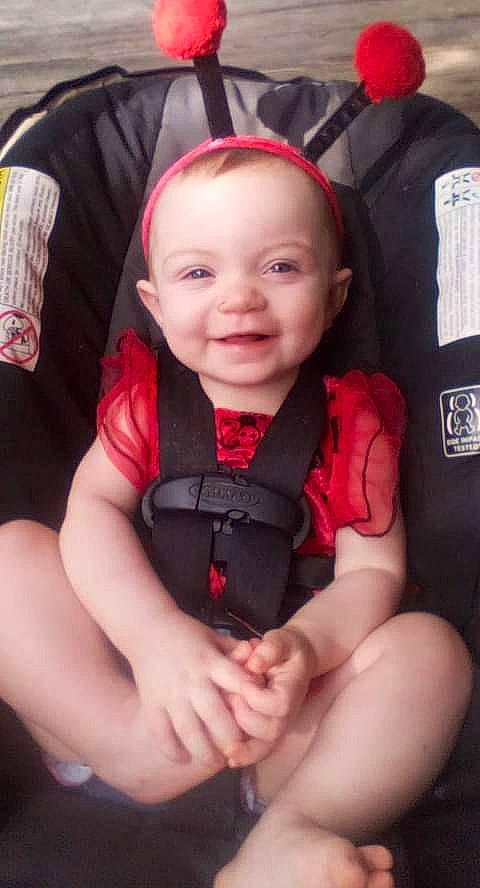 Evelynn is registered to the contest to win money with this photo: arm, cheek, chin, comfort, eye, eyebrow, gesture, hair, hand, head, human_body, iris, joy, leg, lip, mouth, person, plant, seat_belt, skin