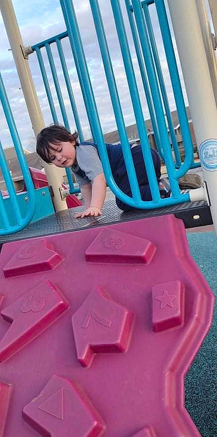 Lucian joined the competition — help win amazing prizes! baby_products, bag, blue, child, electric_blue, flooring, fun, leisure, luggage_and_bags, magenta, person, pink, plastic, product, recreation, red, room, sandal, shorts, sitting