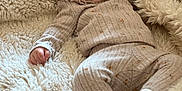 Saige joined the competition — help win amazing prizes! baby, sleeping, blanket, cozy, pajamas, infant, soft, cute, resting, child, comfort, warm, face, hand, foot, fuzzy, texture, indoors, peaceful, relaxation