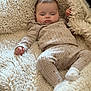 baby, sleeping, blanket, cozy, pajamas, infant, soft, cute, resting, child, comfort, warm, face, hand, foot, fuzzy, texture, indoors, peaceful, relaxation