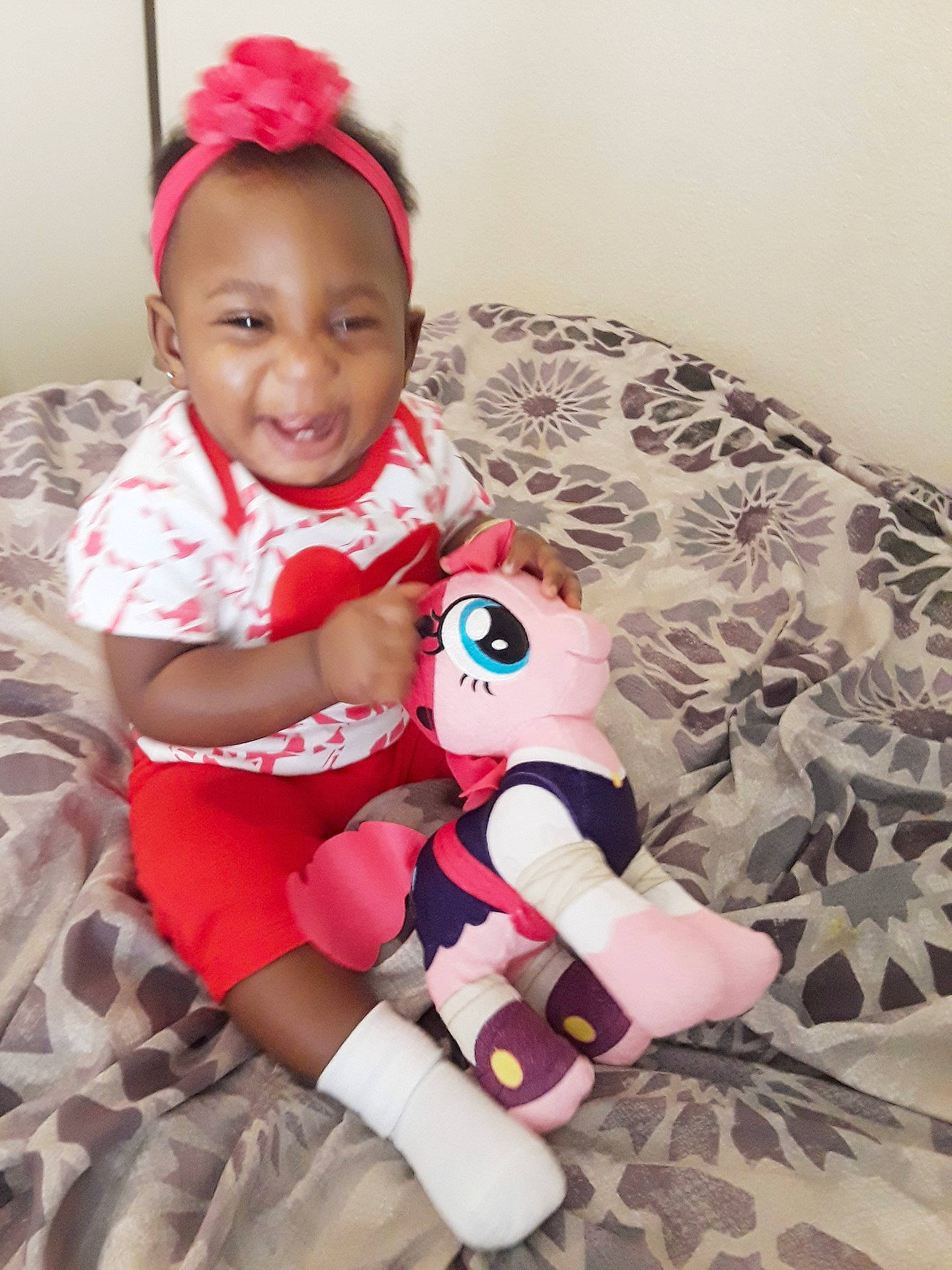 Trenity joined the competition — help win amazing prizes! baby_products, child, day, girl, hair_accessory, infant, joy, material, person, pink, product, red, skin, smile, stuffed_toy, textile, toddler, toy