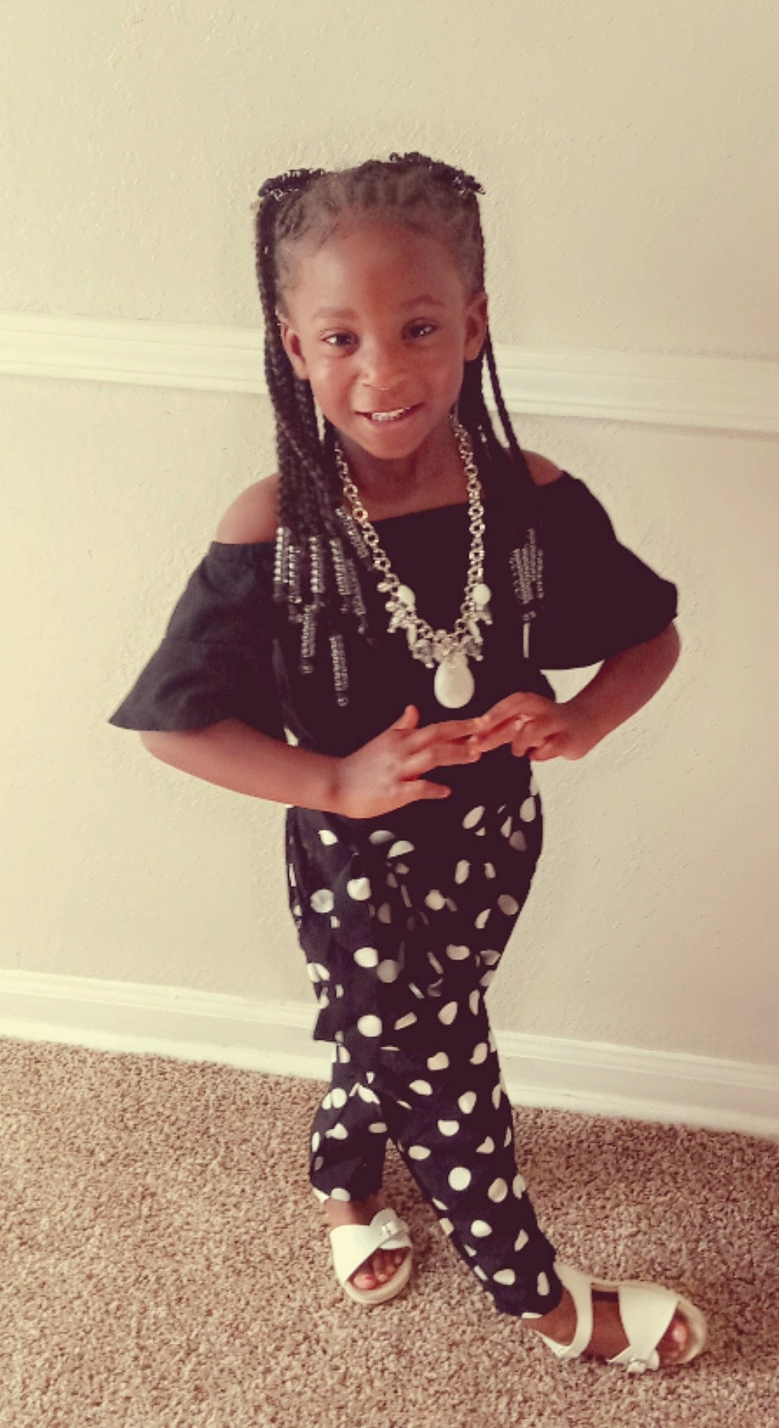 Trenity is registered to the contest to win money with this photo: arm, dress, face, fashion_design, hair, hairstyle, happy, head, human_body, joy, knee, leg, neck, person, shoulder, sleeve, smile, t_shirt, thigh, toddler