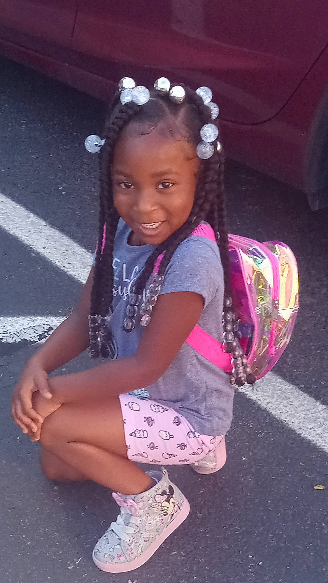 Trenity is registered to the contest to win money with this photo: black_hair, child, cool, facial_expression, fun, hairstyle, happy, head, headgear, human, human_leg, joy, leg, magenta, person, pink, purple, skin, smile, standing