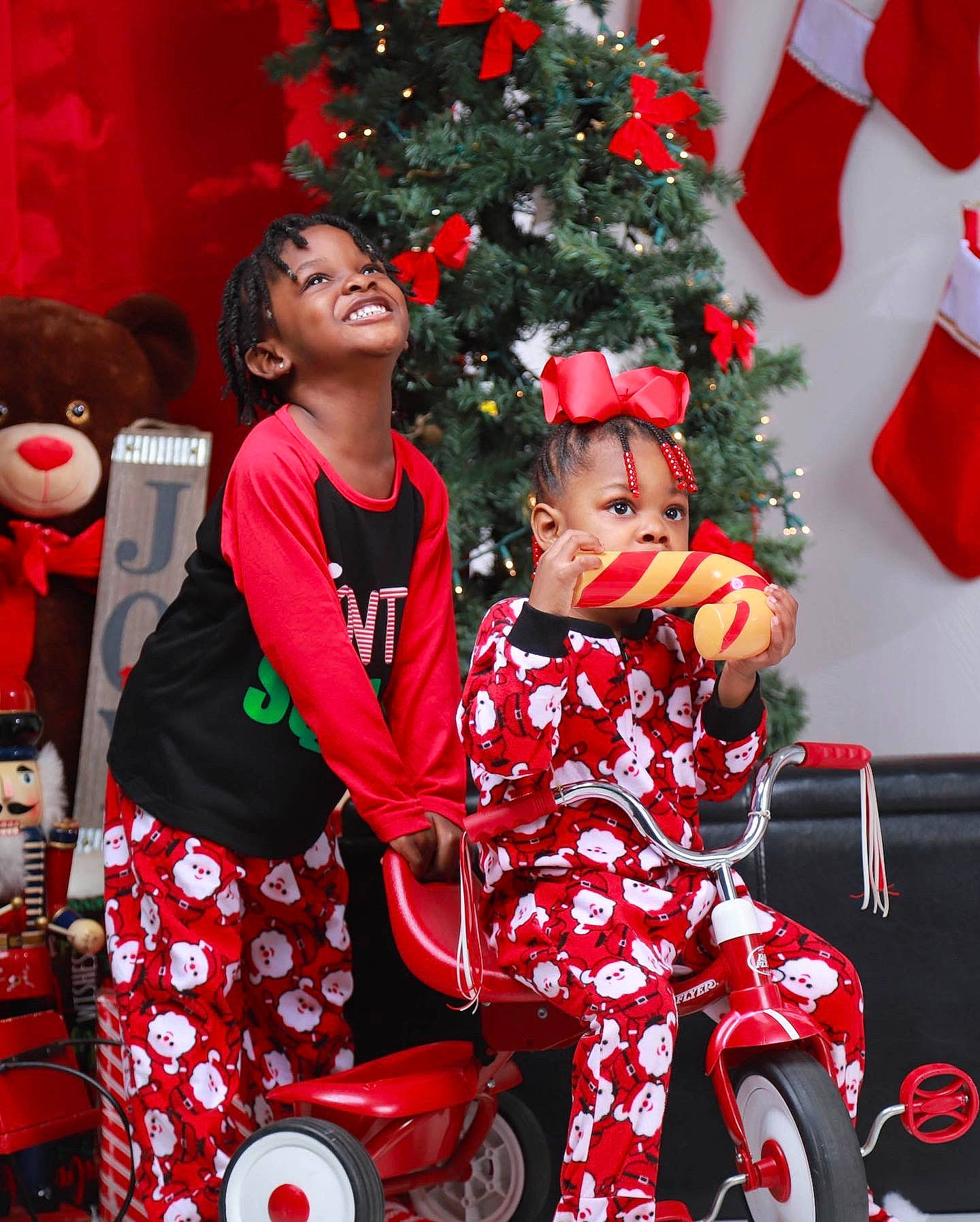 Anthony is registered to the contest to win money with this photo: christmas, christmas_decoration, christmas_eve, christmas_ornament, christmas_tree, event, fun, happy, holiday, holiday_ornament, joy, lap, motor_vehicle, person, photograph, red, snapshot, tire, tradition, vehicle