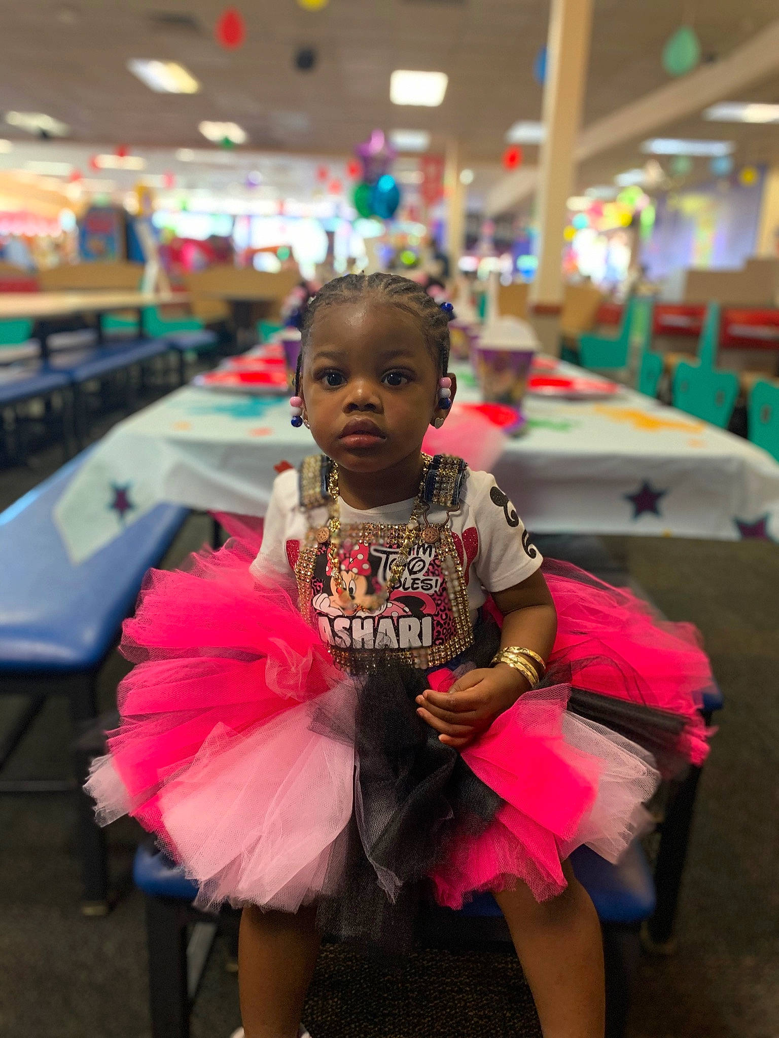 Ashari is registered to the contest to win money with this photo: beauty, child, costume, event, flooring, fun, happy, leisure, magenta, people, person, photograph, pink, public_space, recreation, sitting, skin, snapshot, toddler, travel