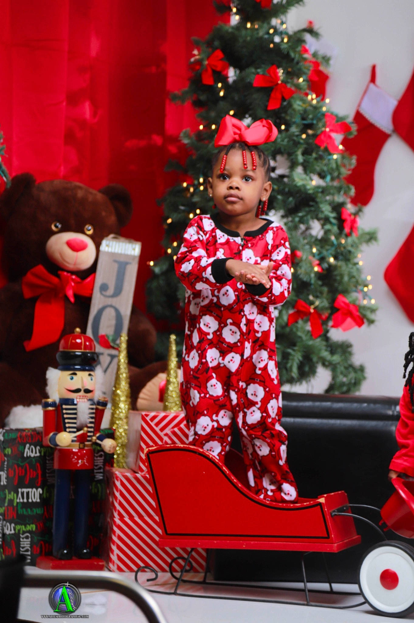 Ashari is registered to the contest to win money with this photo: christmas, christmas_decoration, christmas_eve, christmas_ornament, christmas_tree, event, evergreen, fictional_character, fun, holiday, holiday_ornament, interior_design, ornament, person, red, santa_claus, standing, toddler, toy, tradition