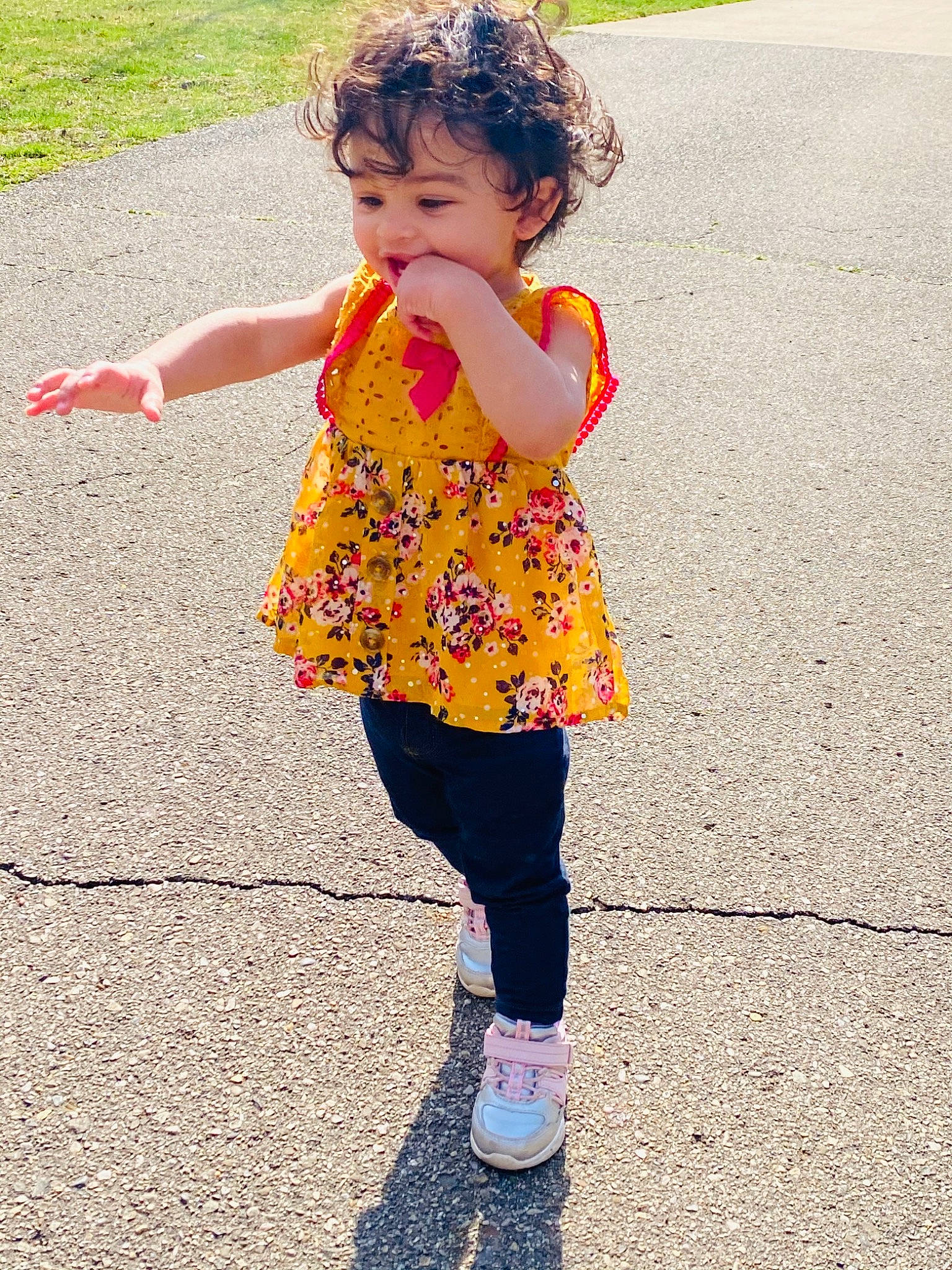 Zaniyah joined the competition — help win amazing prizes! asphalt, baby_toddler_clothing, face, gesture, grass, happy, head, human_leg, leg, leisure, magenta, people, people_in_nature, person, pink, plant, recreation, road_surface, sleeve, toddler