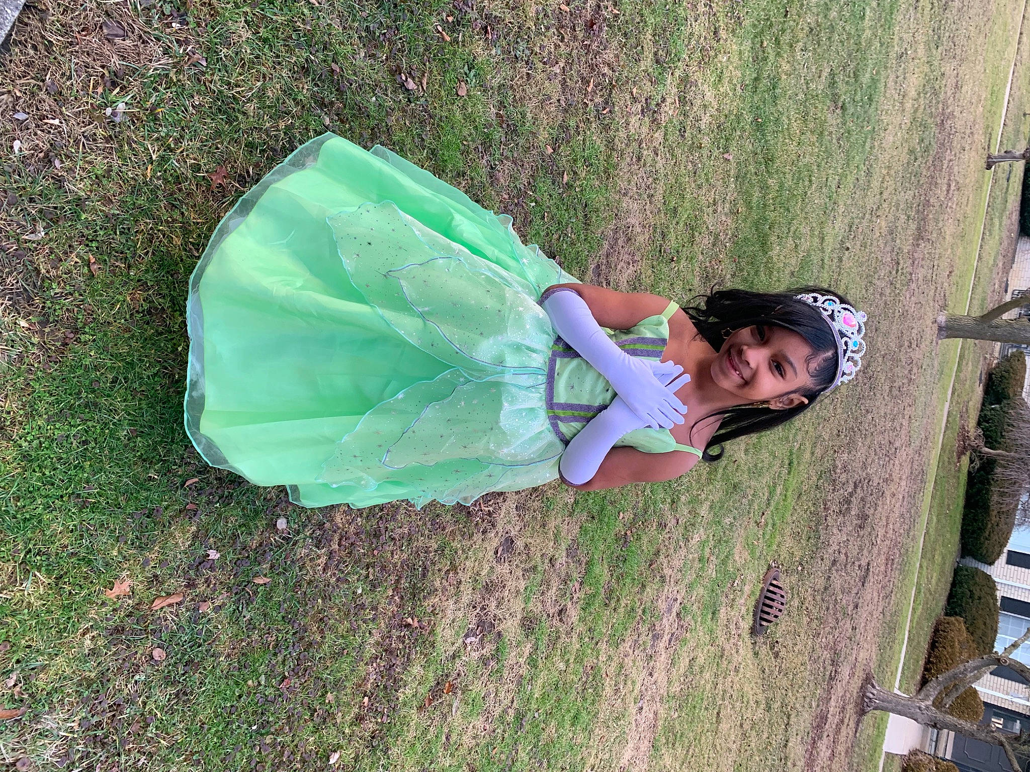 Kennedi is registered to the contest to win money with this photo: child, fashion_accessory, fence, fun, grass, grass_family, grassland, joy, leisure, people_in_nature, person, plant, plastic, plastic_bag, recreation, shade, soil, tints_and_shades, tree, wheel