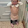 Meïly participe au concours pour gagner de l'argent avec cette photo : child, girl, indoor, posing, pink_shoes, pink_skirt, white_blouse, headband, smiling, floor_tiles, door, window, wall_tiles, hands_on_face, cute, standing, young, portrait, happy, home