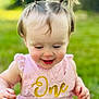 toddler, child, smiling, pink_dress, lace, hair_ties, pony_tail, outdoor, grass, one, celebration, happy, cute, person, baby, portrait, closeup, young_child, fun, nature