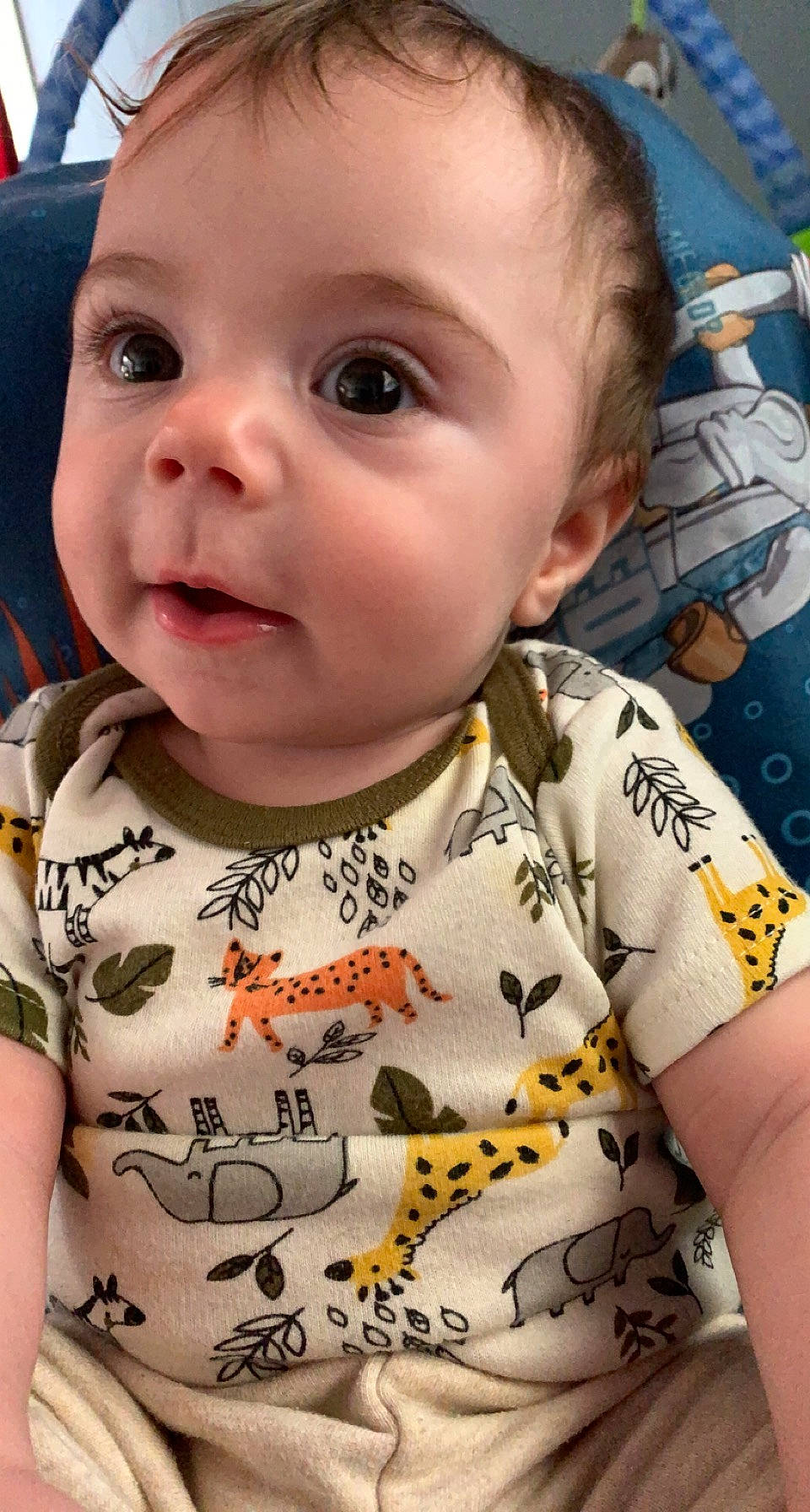 Carter is registered to the contest to win money with this photo: arm, baby, baby_toddler_clothing, cheek, chin, ear, eyebrow, eyelash, face, forehead, head, lip, mammal, mouth, neck, nose, organ, person, product, skin