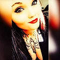 Asheley M.