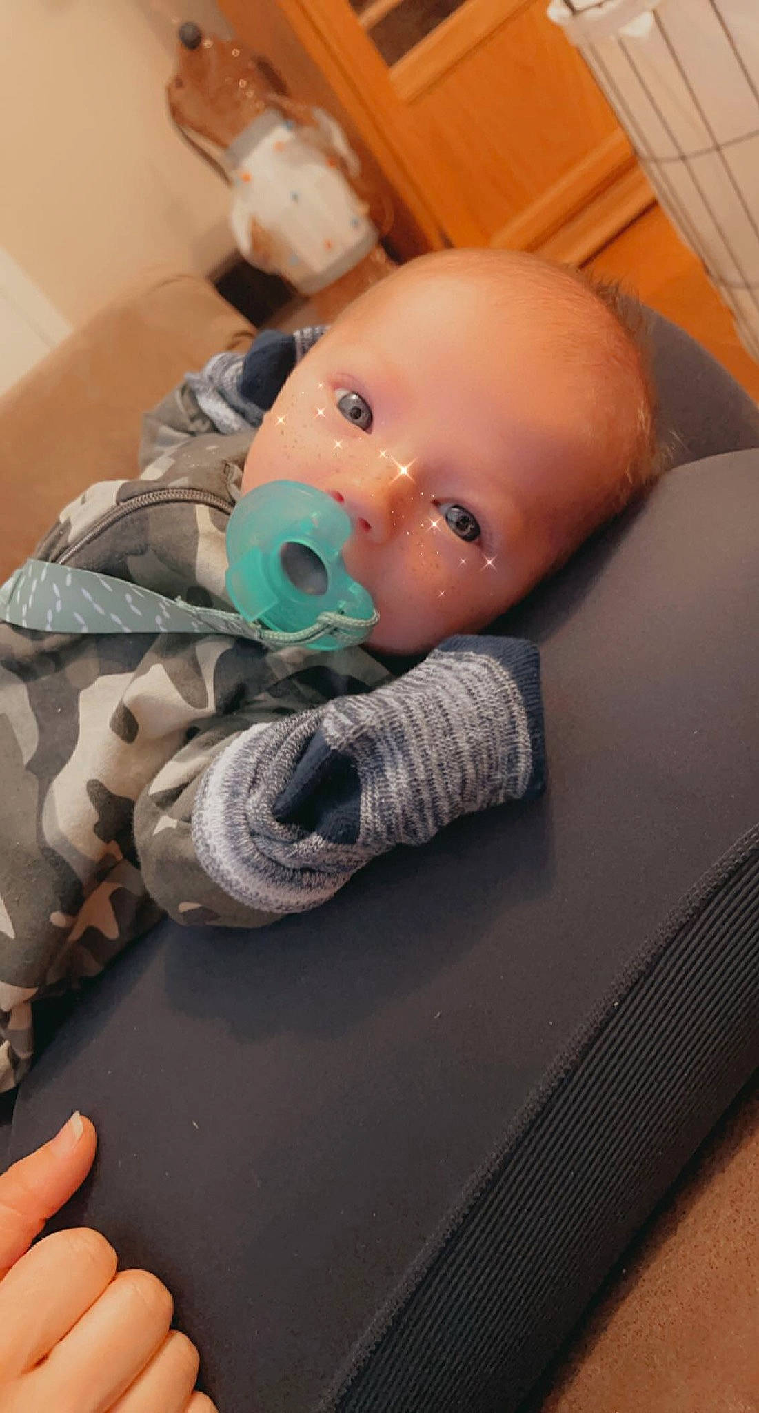 Drake is registered to the contest to win money with this photo: baby, baby_products, baby_safety, baby_sleeping, baby_toys, bed, car_seat, carmine, cheek, child, comfort, finger, linens, nail, person, room, sitting, stuffed_toy, toddler, toy