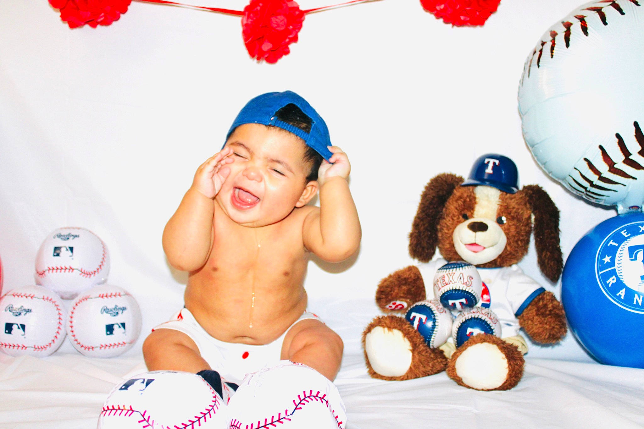 Ryan Eli is registered to the contest to win money with this photo: animal_figure, baby, baby_toddler_clothing, baby_toys, balloon, child, event, facial_expression, fictional_character, font, fun, happy, party_supply, person, photo_caption, plush, sharing, smile, stuffed_toy, toddler