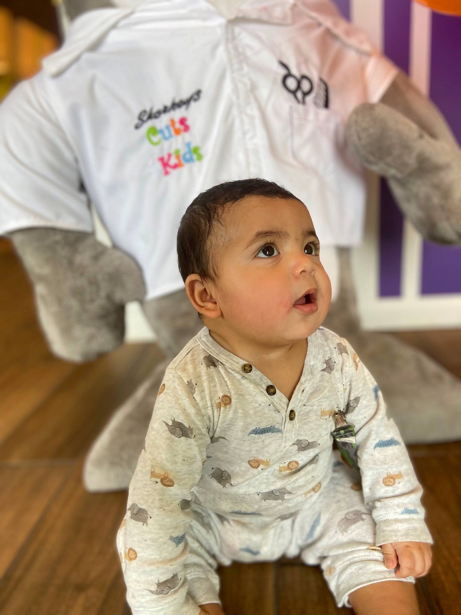 Ryan Eli joined the competition — help win amazing prizes! baby, baby_toddler_clothing, cheek, child, collar, eye, face, floor, flooring, hair, happy, head, nose, person, skin, sleeve, t_shirt, toddler, white, wood