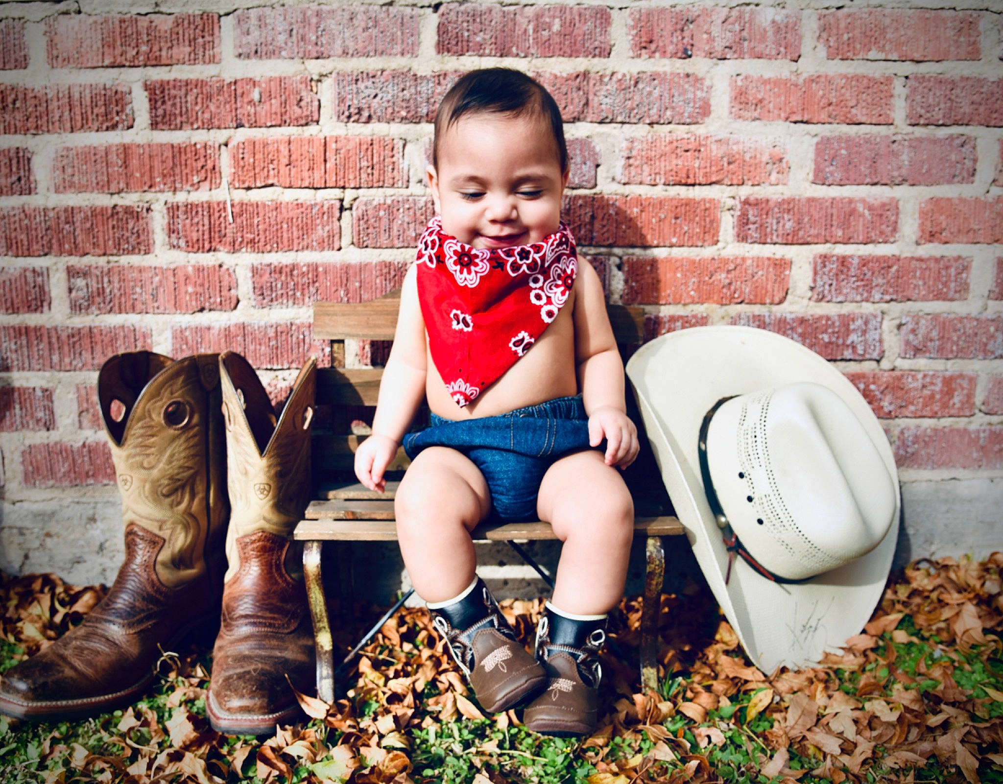 Aaron James is registered to the contest to win money with this photo: baby, boot, child, child_model, cool, cowboy_boot, eye, family, footwear, happy, human_leg, joy, leg, person, play, shoe, sitting, toddler, wheat_beer