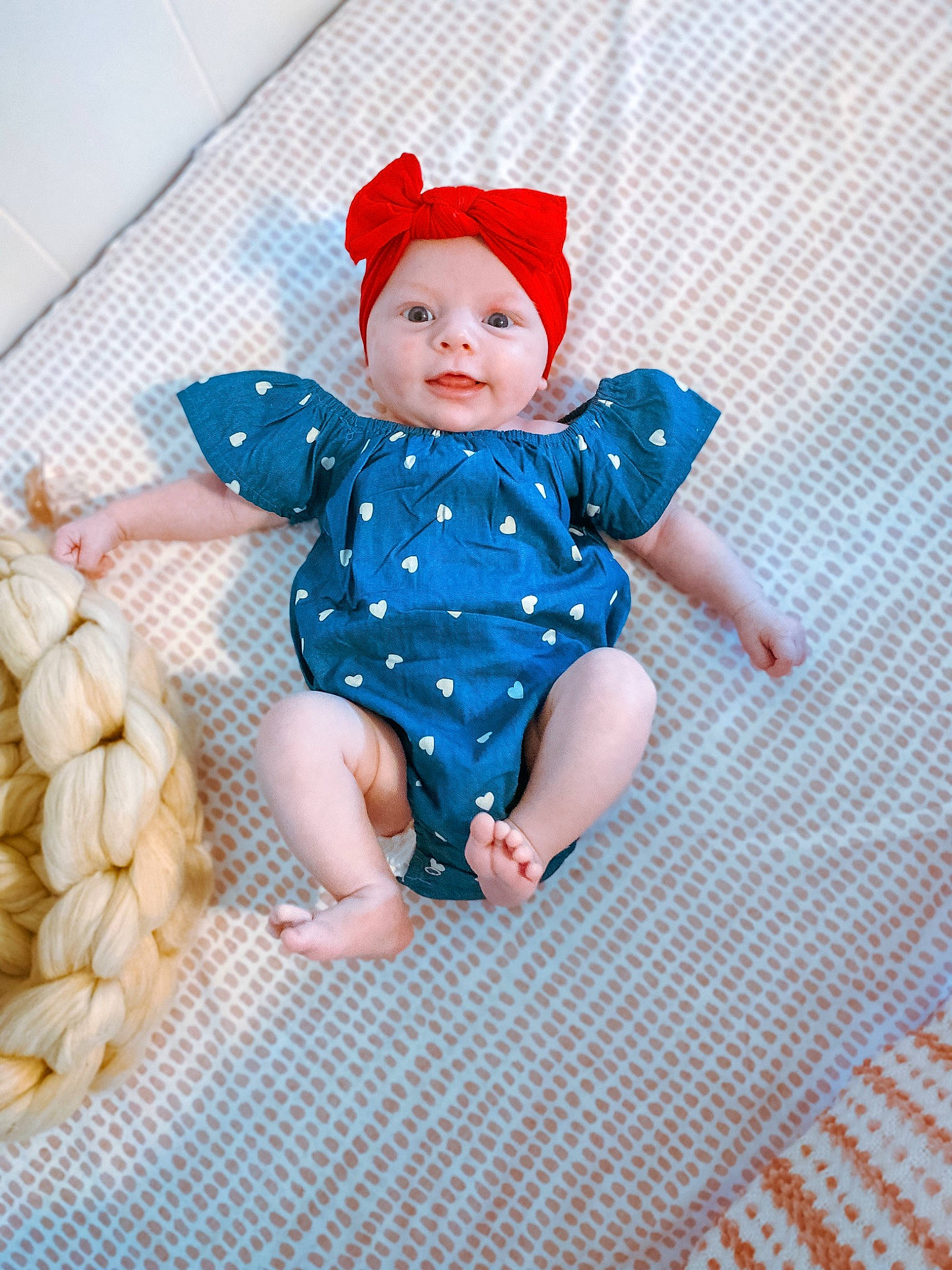 Lylah joined the competition — help win amazing prizes! baby, baby_products, baby_toddler_clothing, baby_toys, beanie, carmine, child, doll, dress, electric_blue, fashion_accessory, headwear, linens, magenta, pattern, person, polka_dot, sitting, sleeve, toddler