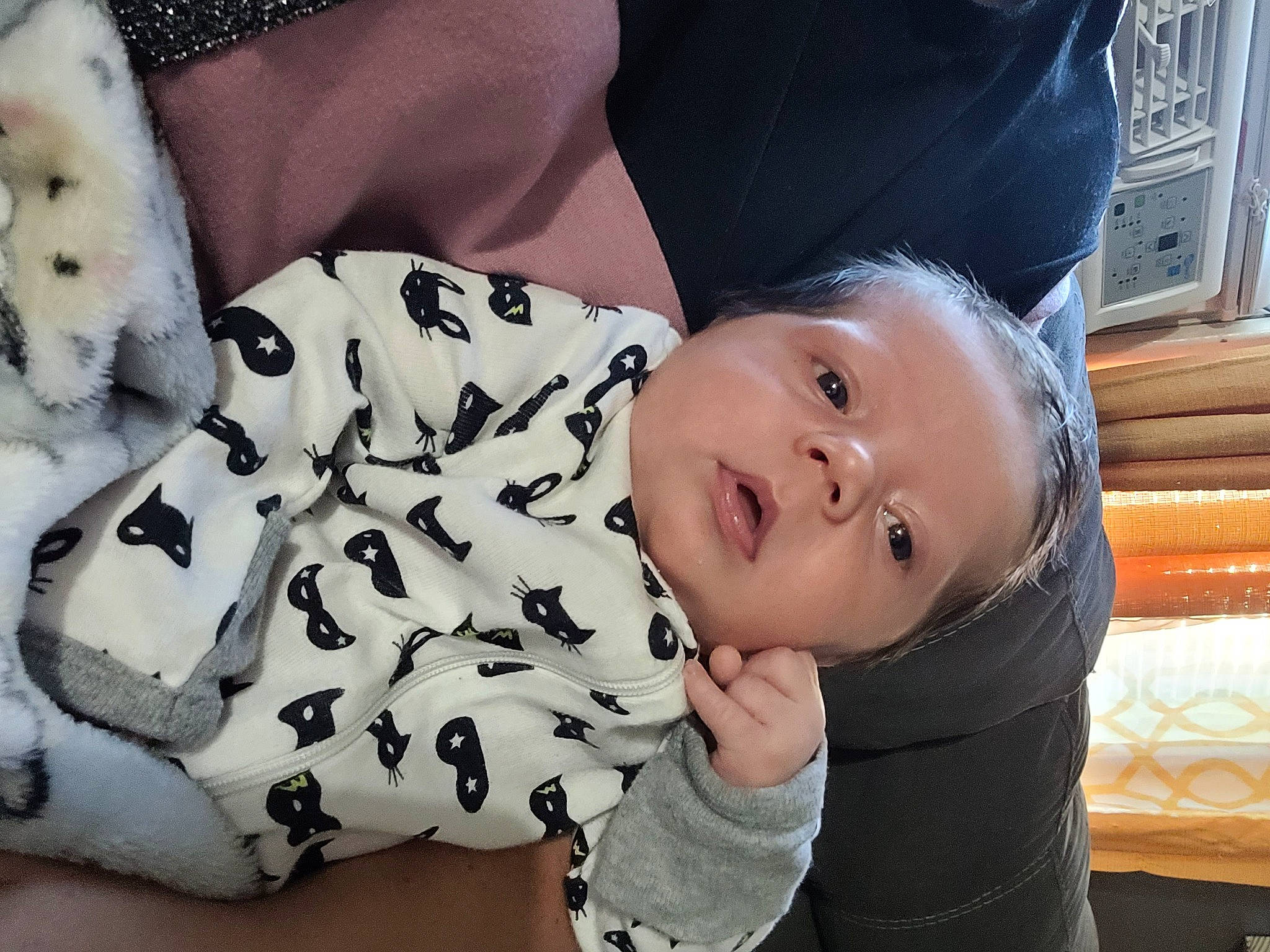 Zacheriah is registered to the contest to win money with this photo: baby, baby_toddler_clothing, child, clothing, collar, comfort, happy, human, mammal, pattern, person, sitting, skin, sleeve, smile, textile, toddler, toy, vertebrate, white