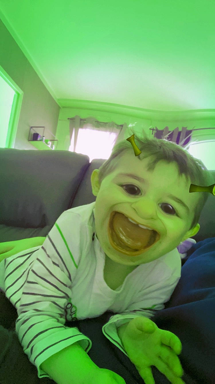 Emiliano a rejoint le concours — aidez-le/la à gagner de superbes lots ! baby, cheek, child, comfort, couch, eye, fun, furniture, grass, green, happy, human_body, jaw, joy, mouth, nose, person, room, skin, smile