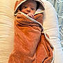 baby, infant, towel, hood, wrapped, cushion, blanket, soft, cozy, face, eyes, hand, newborn, cute, portrait, indoors, resting, child, person, warm