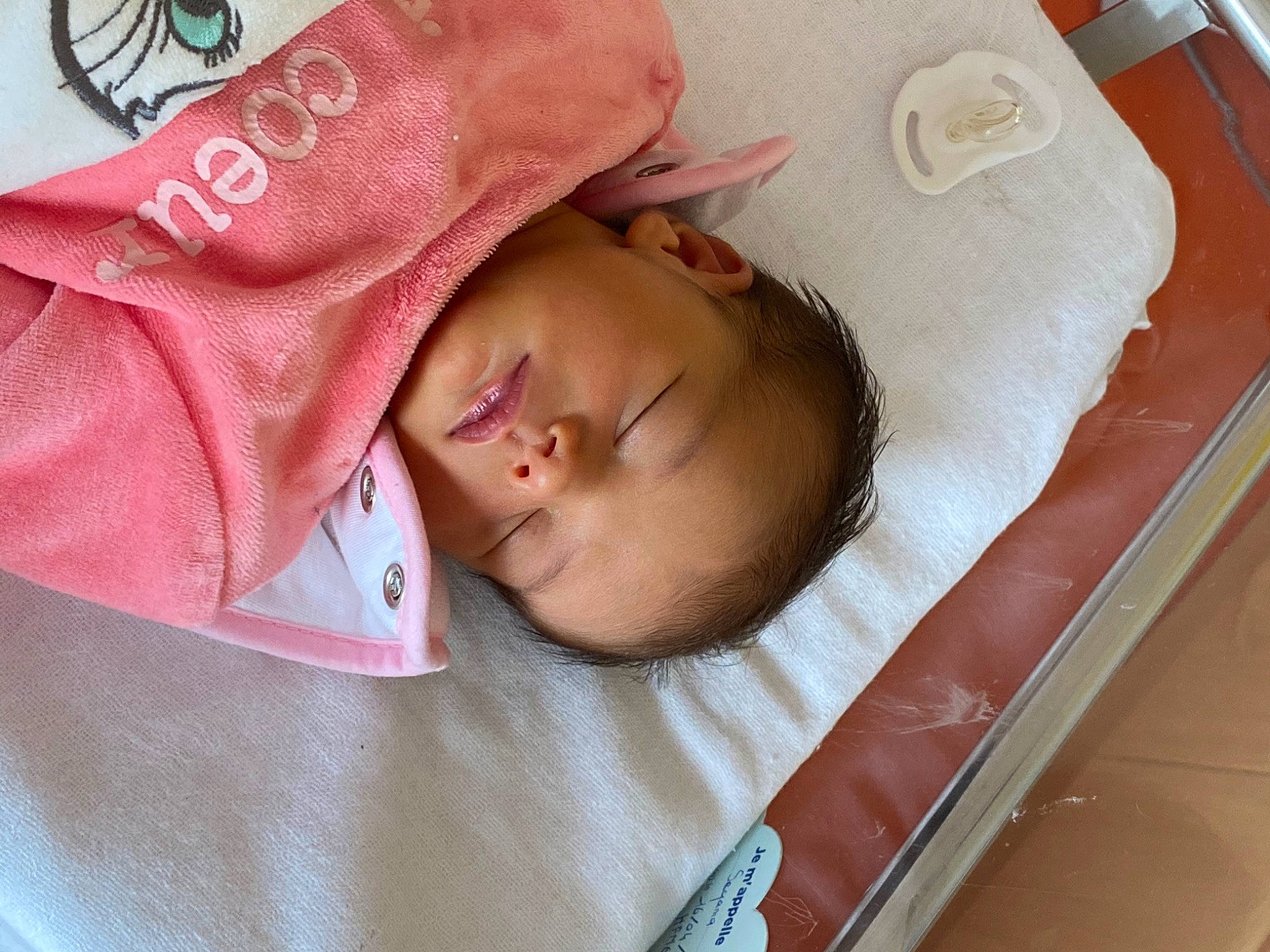 Seyana participe au concours pour gagner de l'argent avec cette photo : baby, baby_products, baby_sleeping, baby_toddler_clothing, bedtime, carmine, cheek, child, comfort, eyelash, hat, headgear, linens, nap, nose, peach, person, room, skin, sleep