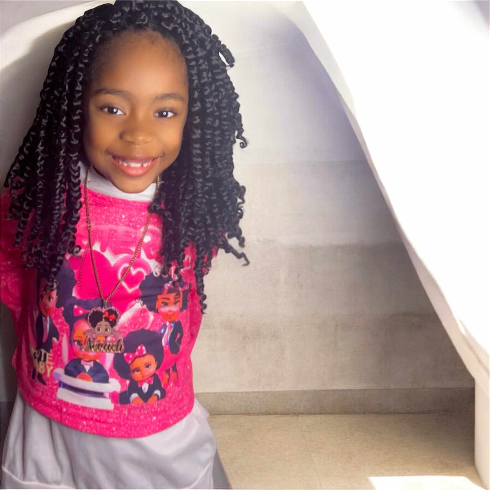 Nevaeh Doctor is registered to the contest to win money with this photo: accessories, baby, blackhair, braid, child, clothing, dress, face, female, girl, hair, happy, head, jewelry, necklace, person, photography, portrait, sleeve, smile