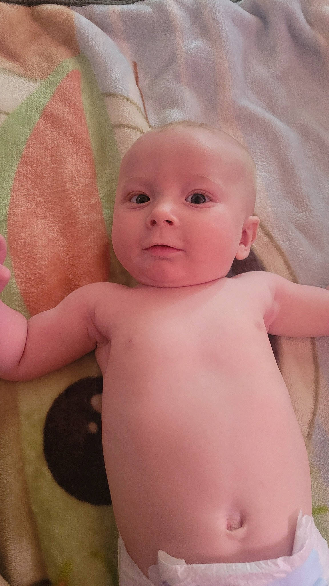 Elizabeth is registered to the contest to win money with this photo: arm, baby, cheek, chin, eye, eyebrow, eyelash, face, finger, hand, head, human_body, joint, lip, mouth, neck, nose, person, skin, smile