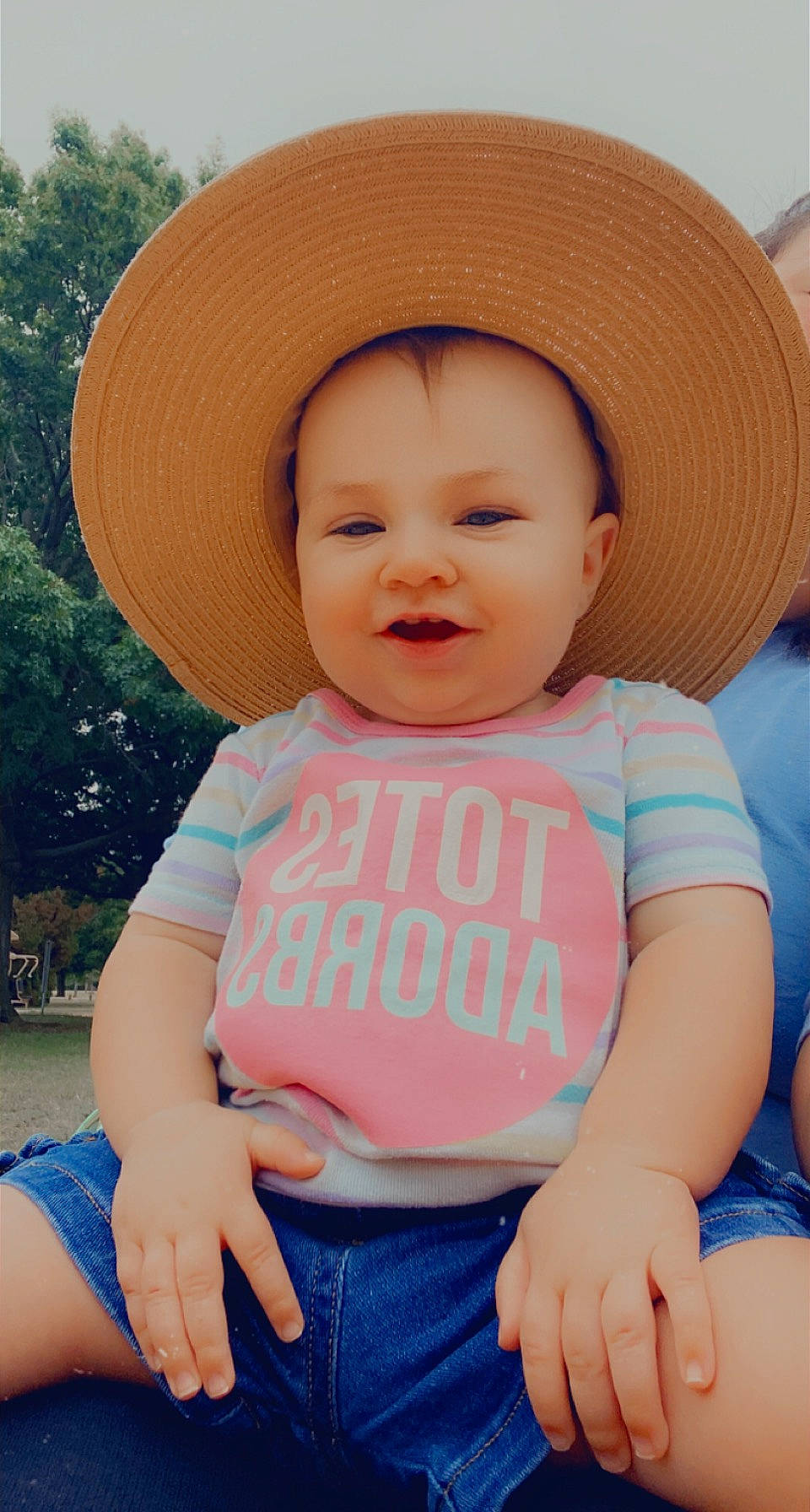 Amelia is registered to the contest to win money with this photo: baby, baby_toddler_clothing, child, chin, cool, face, fun, happy, hat, leisure, lip, mouth, person, photograph, pink, skin, sleeve, smile, sun_hat, toddler