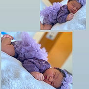 Waïlee participe au concours pour gagner de l'argent avec cette photo : baby, newborn, sleeping, purple_outfit, headband, blanket, soft_texture, indoor, closeup, portrait, infant, cute, peaceful, resting, child, toddler, clothing, fabric, homedecor, warm_lighting