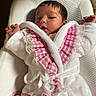 baby, infant, child, robe, pink, white, lace, clothing, cute, portrait, face, hands, soft, cushion, indoor, newborn, sleepwear, relaxed, person, cozy