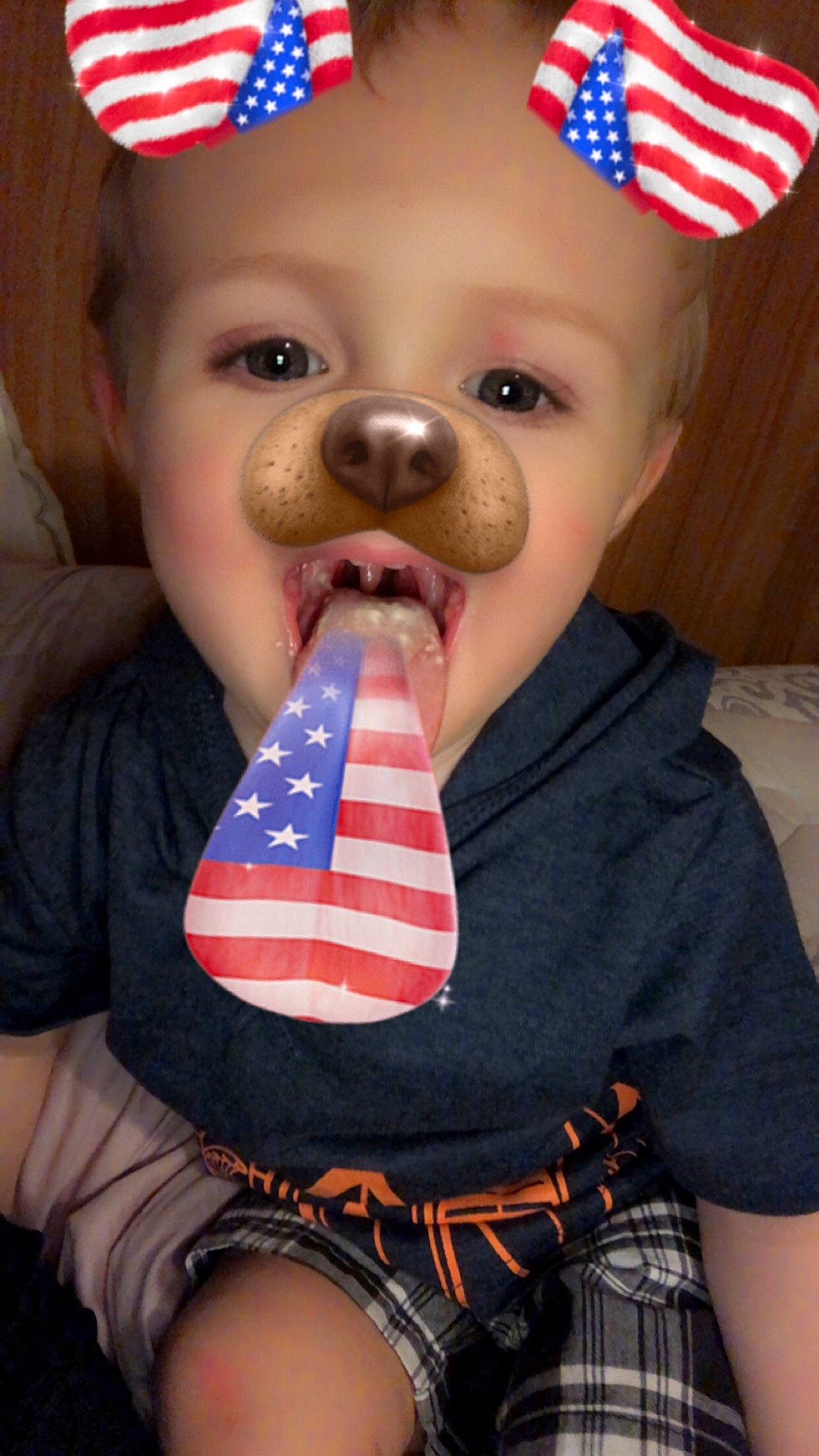 Eric Benson is registered to the contest to win money with this photo: child, flag_of_the_united_states, nose, person