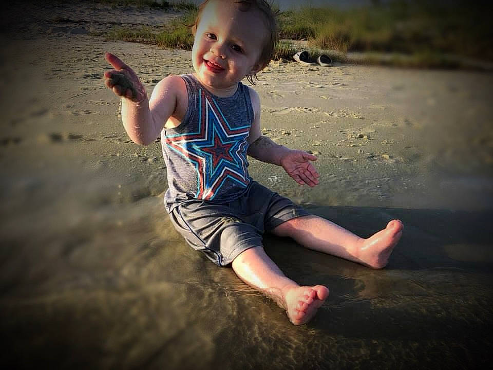 Eric Benson is registered to the contest to win money with this photo: barefoot, child, cloud, cool, eye, flash_photography, fun, hand, happy, joy, leg, person, photograph, photography, play, sand, sky, smile, summer, toddler