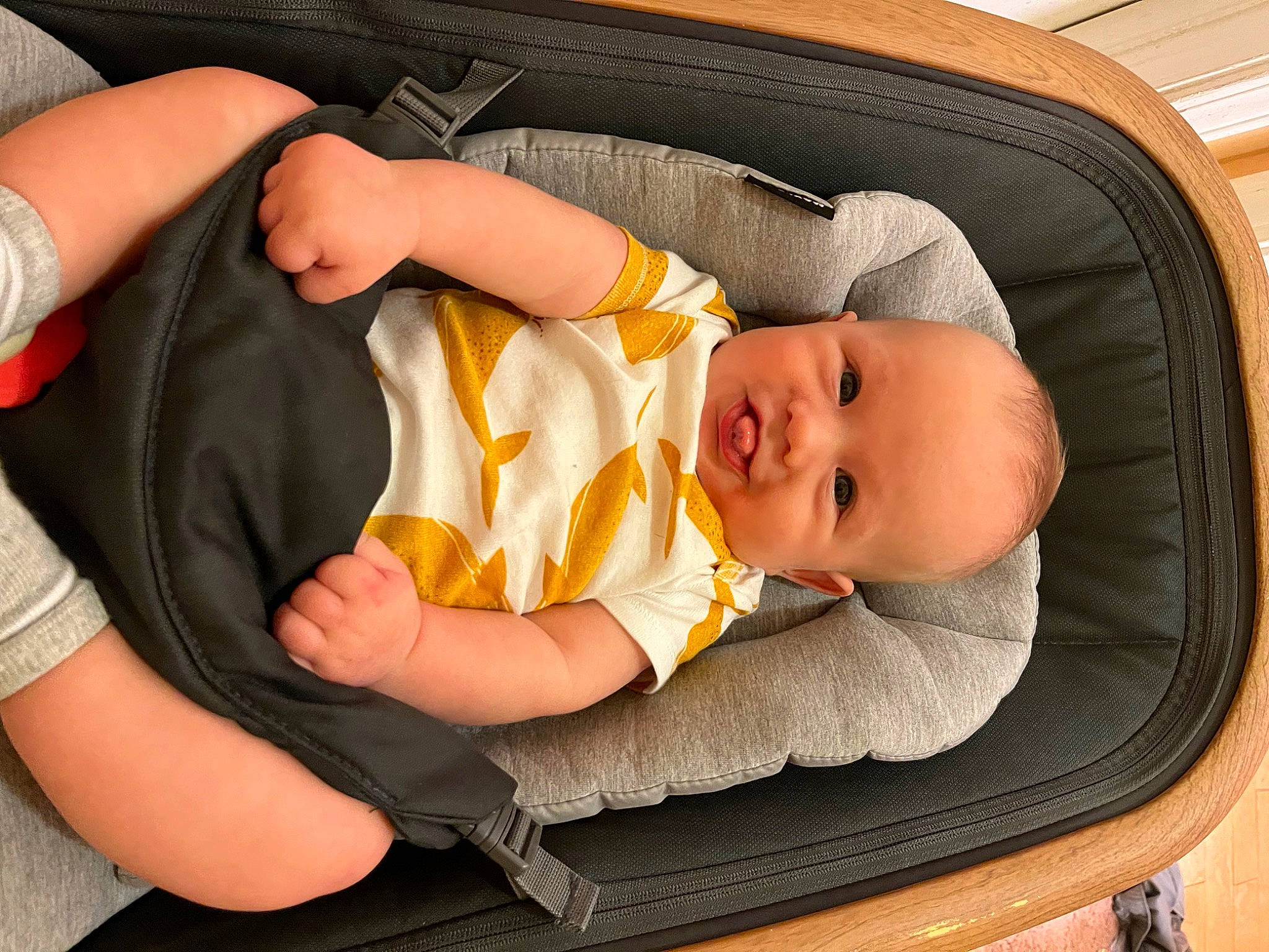 Declan is registered to the contest to win money with this photo: baby, baby_carriage, baby_products, baby_safety, baby_toddler_clothing, child, comfort, face, facial_expression, finger, gesture, lap, linens, nail, person, product, sitting, skin, thumb, toddler