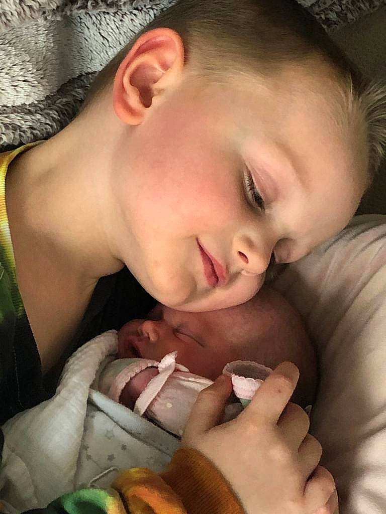 Mason is registered to the contest to win money with this photo: cheek, comfort, ear, eyebrow, eyelash, finger, forehead, gesture, hand, happy, human, lip, mammal, mouth, muscle, nail, neck, nose, organ, person