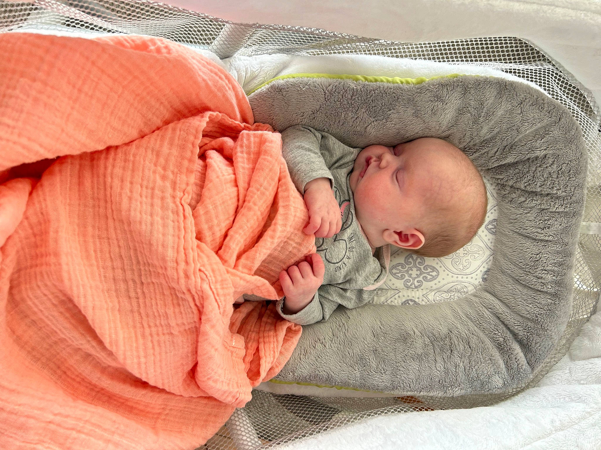 Chloe is registered to the contest to win money with this photo: baby, baby_products, baby_safety, baby_sleeping, baby_toddler_clothing, bedtime, carmine, cheek, child, comfort, face, head, infant_bed, linens, nap, person, skin, sleep, sleeve, textile