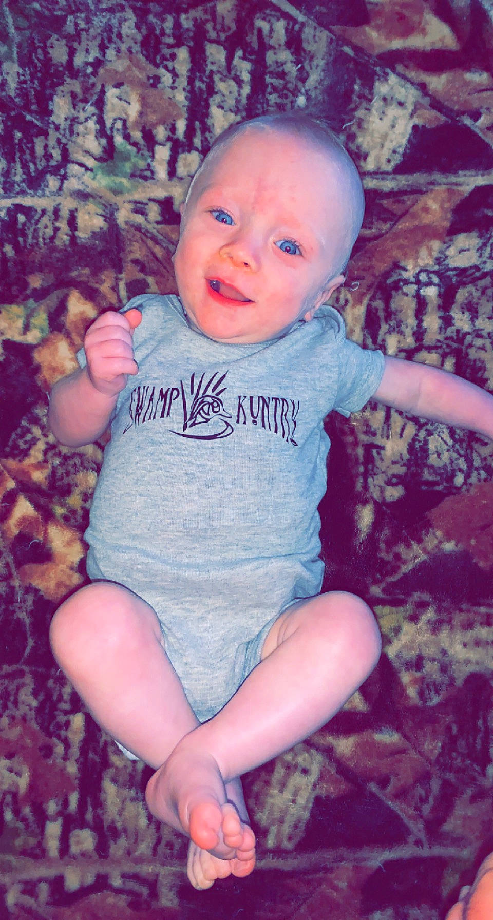 Axton joined the competition — help win amazing prizes! arm, baby_toddler_clothing, cheek, eye, face, finger, hand, happy, head, human_body, iris, lip, mouth, organ, person, pink, purple, skin, sleeve, smile