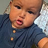 baby, blue_shirt, casual, child, closeup, clothing, curious, curtains, cute, expression, face, home, indoor, infant, person, portrait, reaching, toddler, wooden_buttons, young