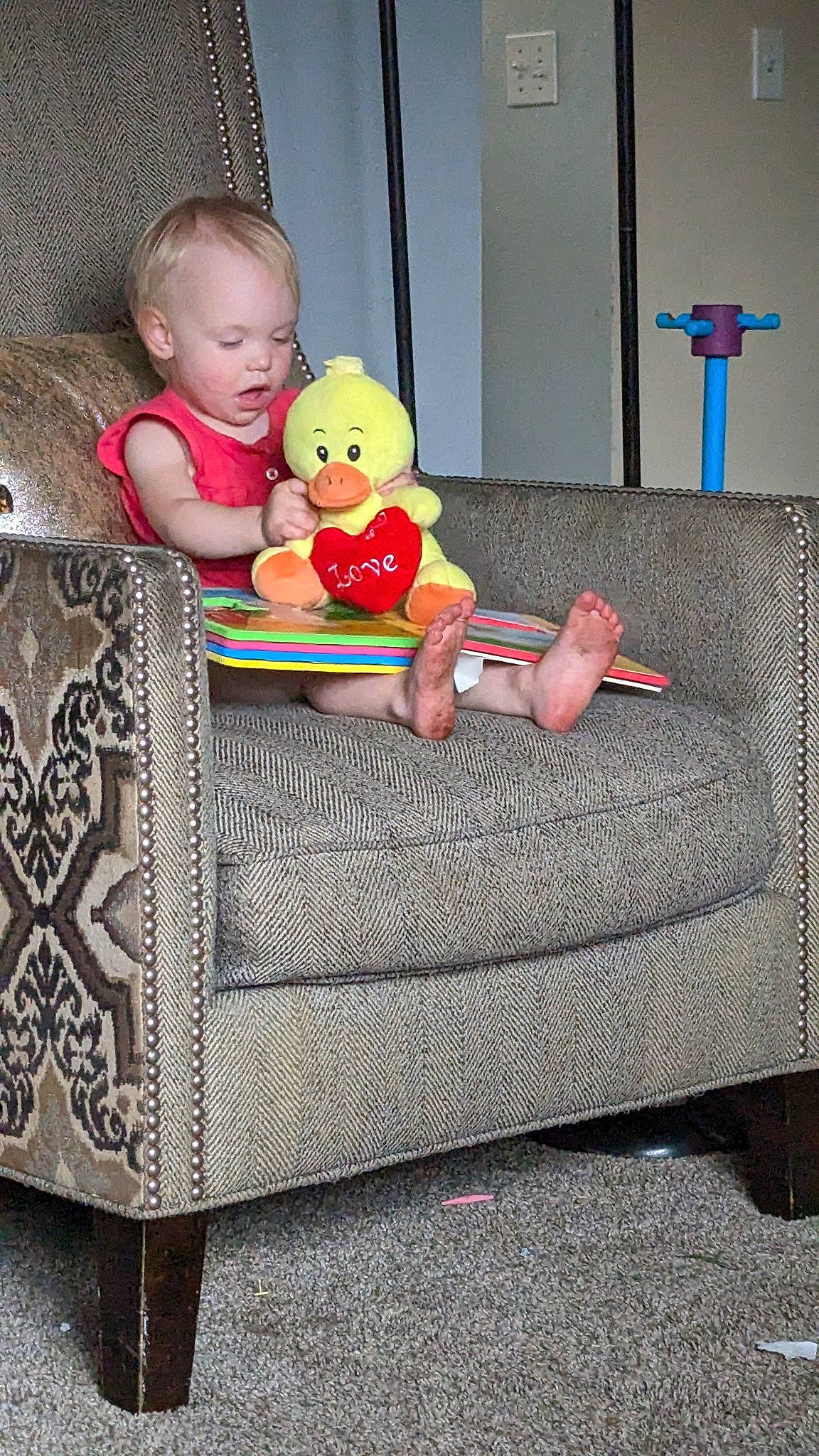 Evie joined the competition — help win amazing prizes! baby, baby_products, baby_toddler_clothing, baby_toys, carpet, child, comfort, couch, flooring, linens, living_room, person, product, rectangle, room, sitting, stuffed_toy, textile, toddler, toy