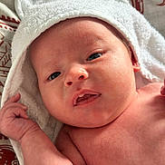 Bear joined the competition — help win amazing prizes! baby, newborn, infant, towel, white_towel, skin, face, eyes, mouth, hand, closeup, portrait, cute, sleepwear, bed, soft, child, young, fresh, adorable