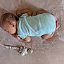 Soan participe au concours pour gagner de l'argent avec cette photo : baby, sleeping, infant, pacifier, blanket, onesie, child, cute, resting, soft, toy, lying_down, peaceful, indoors, newborn, small, toddler, comfort, nap, skin