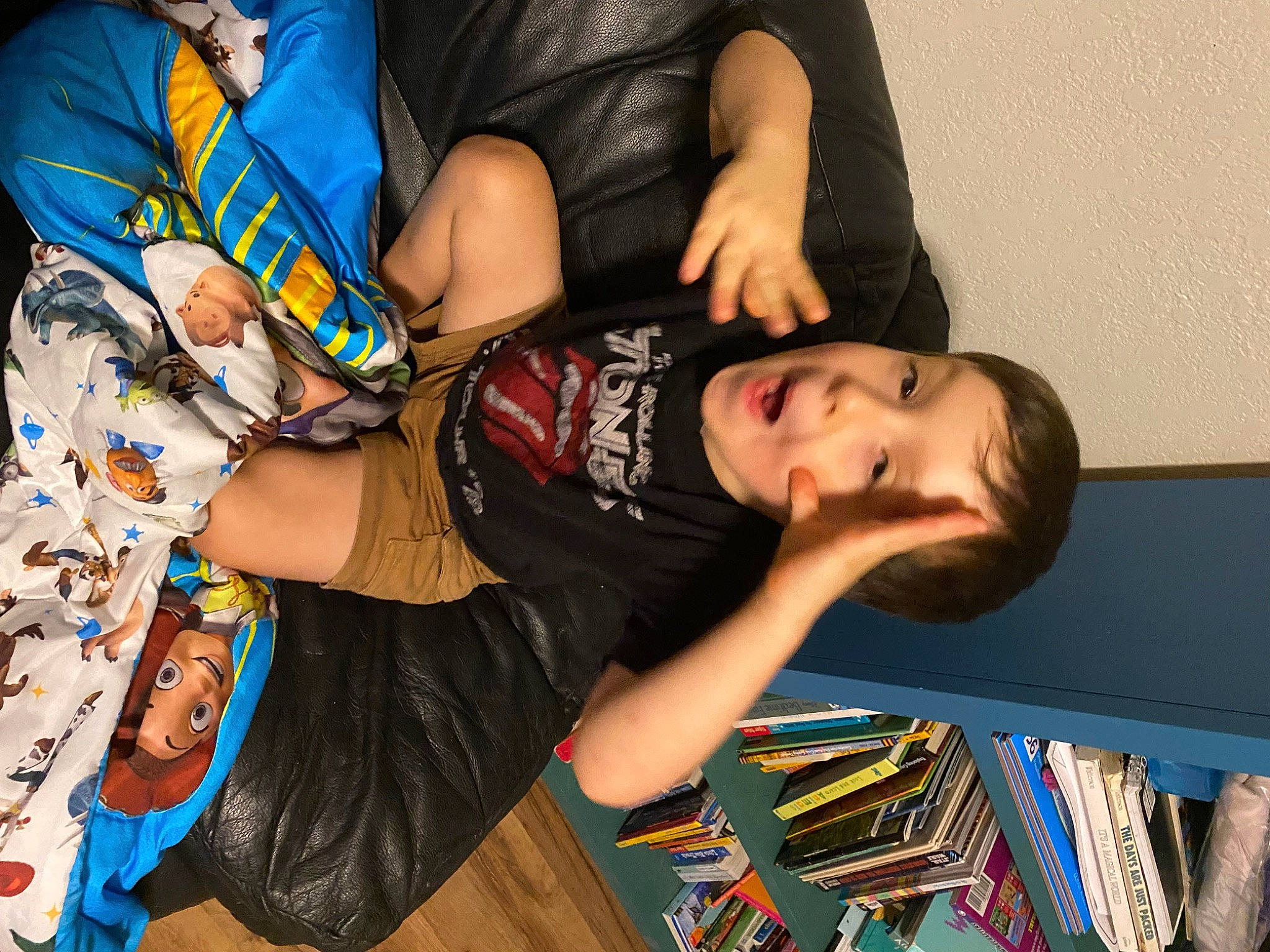 Alyx joined the competition — help win amazing prizes! bookcase, child, elbow, fun, nail, person, room, t_shirt, thigh, toddler, visual_arts, wood, wrist