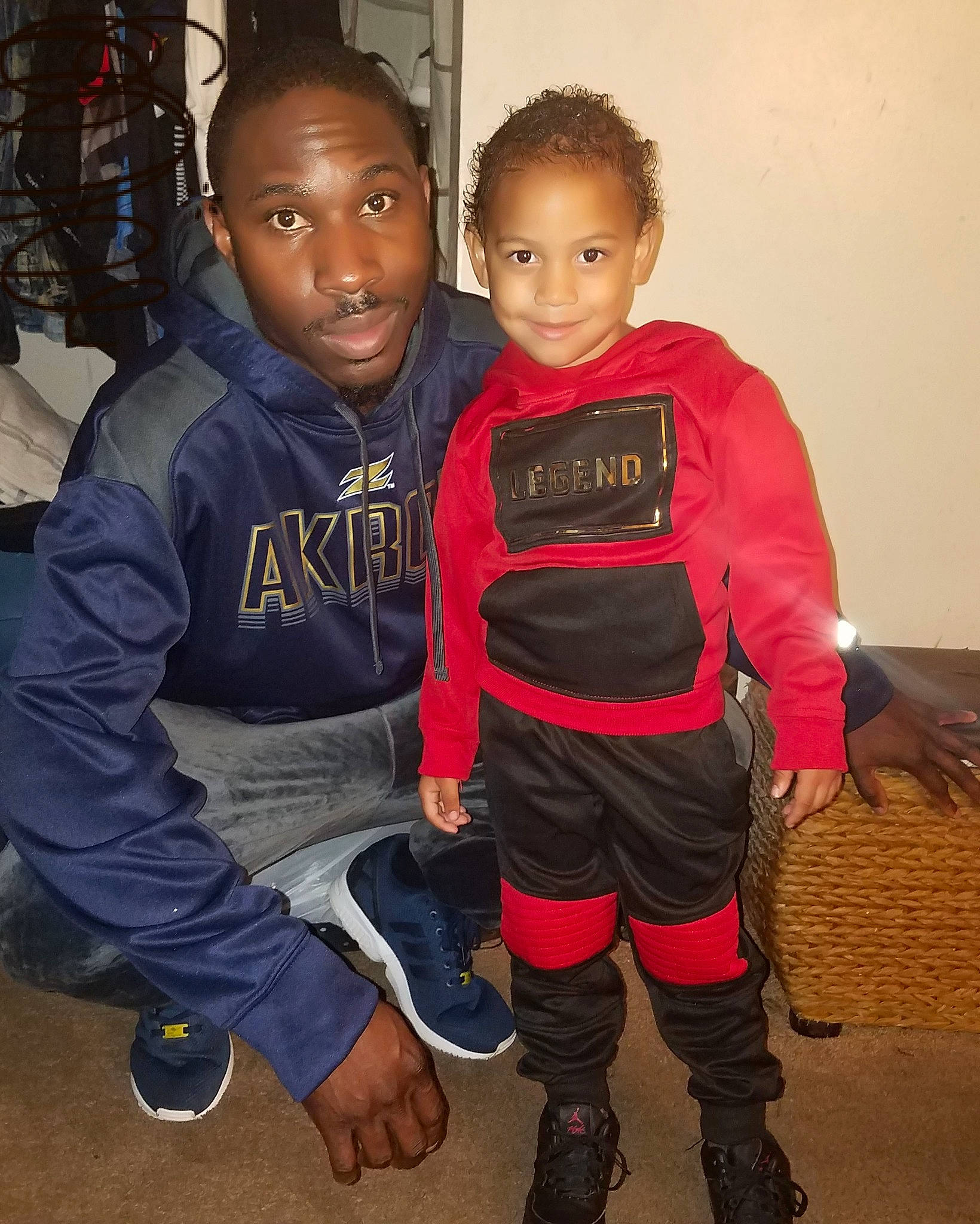 Jakai joined the competition — help win amazing prizes! boy, child, cool, day, footwear, fun, girl, outerwear, person, personal_protective_equipment, product, red, smile, standing, toddler, youth