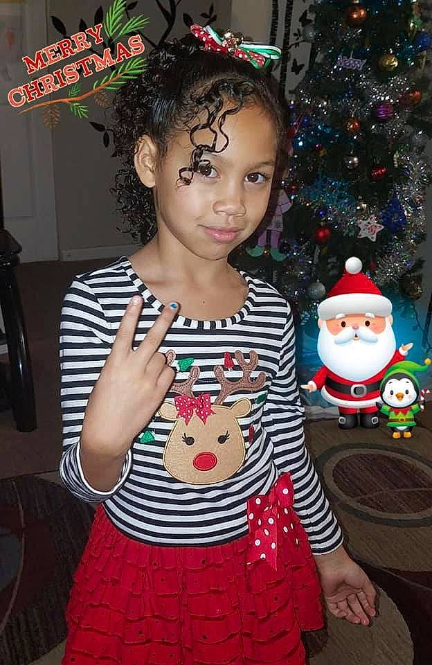 Surriah joined the competition — help win amazing prizes! black_hair, brown_hair, child, christmas, event, girl, holiday, pattern, person, product, smile, textile, toddler