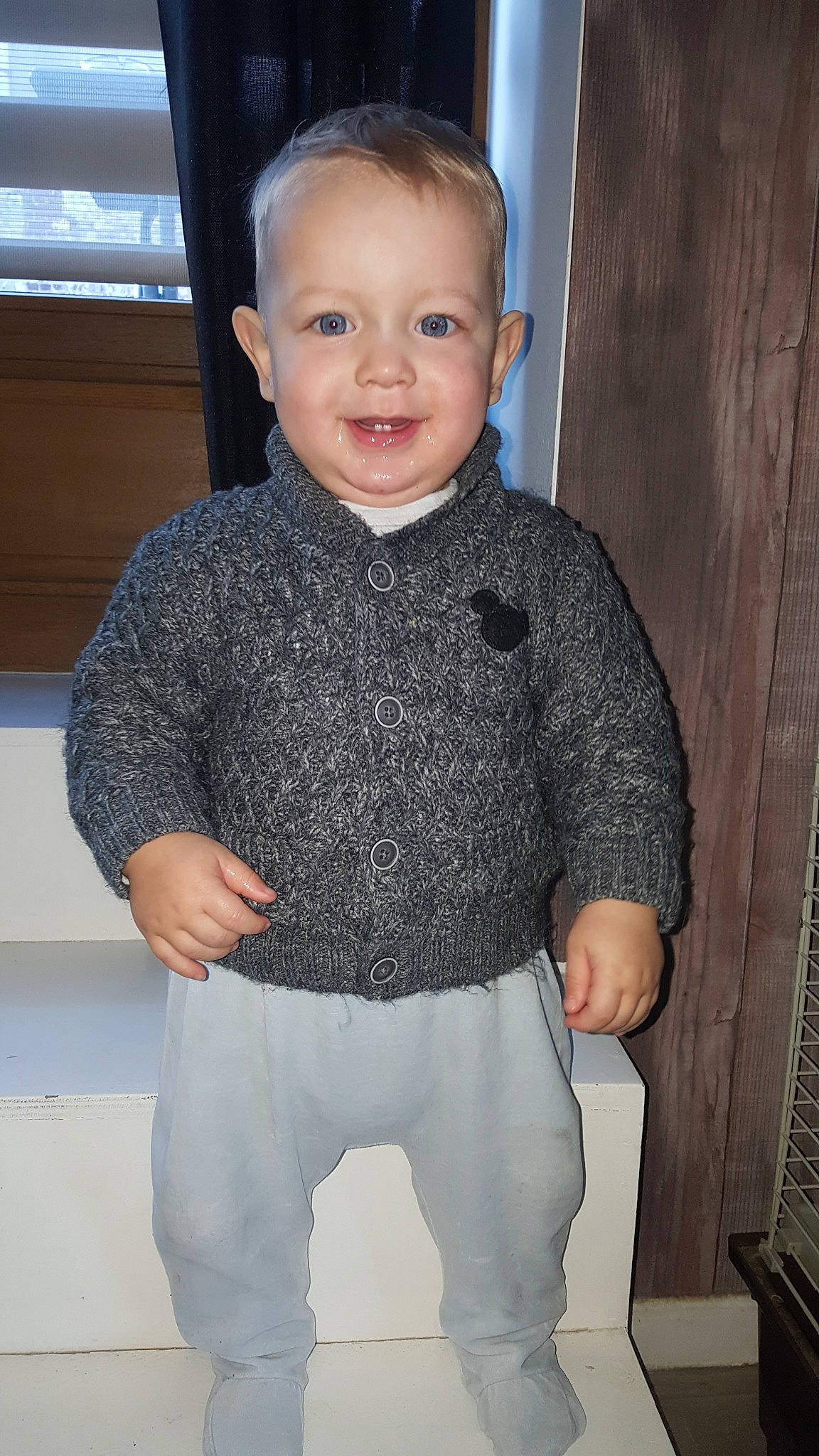 James participe au concours pour gagner de l'argent avec cette photo : boy, child, fun, girl, infant, jeans, joy, knitting, material, outerwear, pattern, person, product, skin, sleeve, smile, standing, sweater, textile, toddler